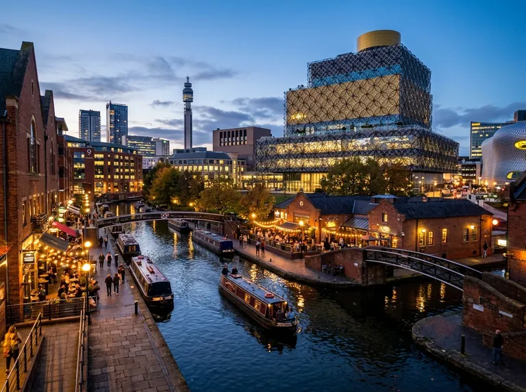 Birmingham city centre at dusk with the Library of Birmingham, canals and Brindleyplace